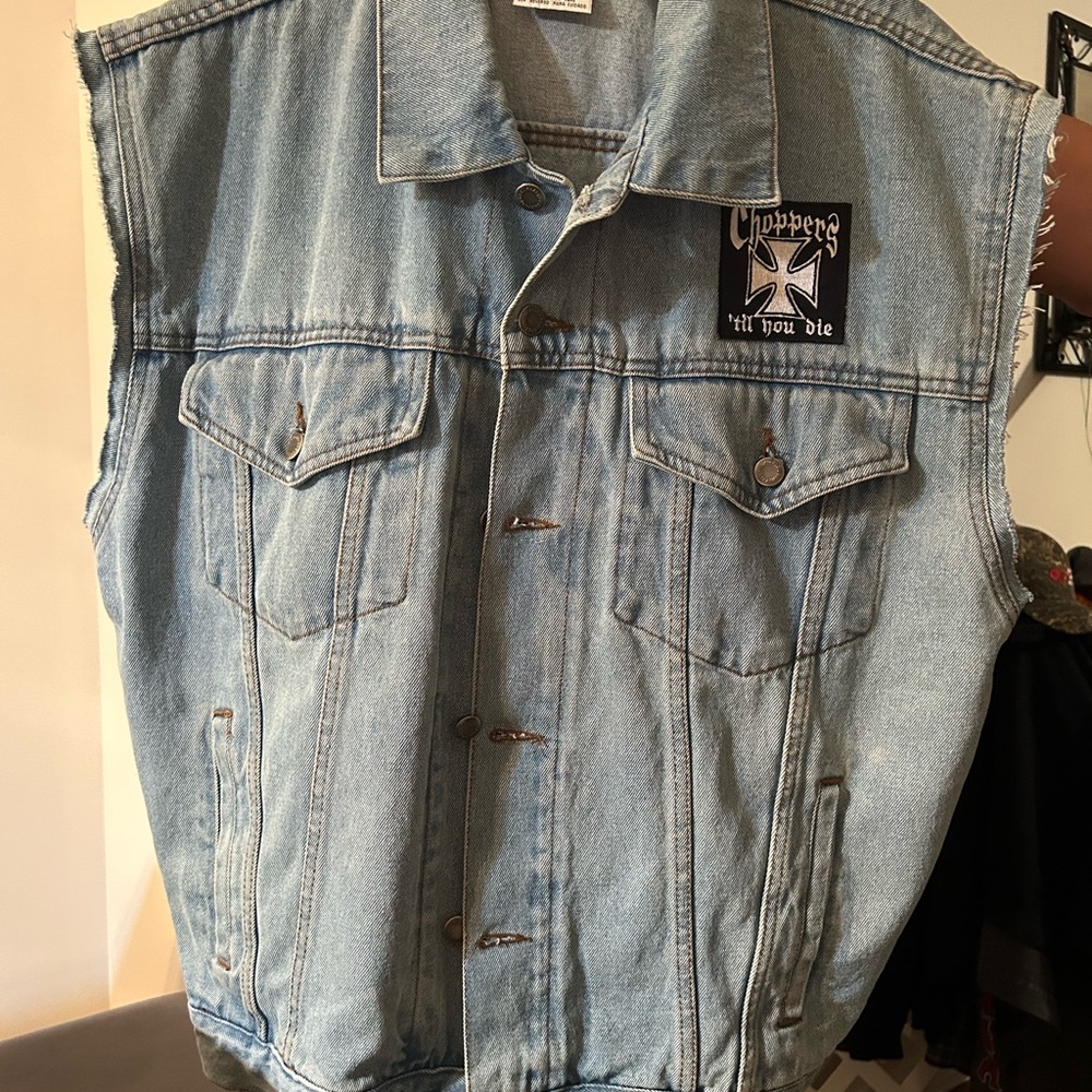 Light Blue Denim Vest with Sleeveless Design and Shirt-Style Collar